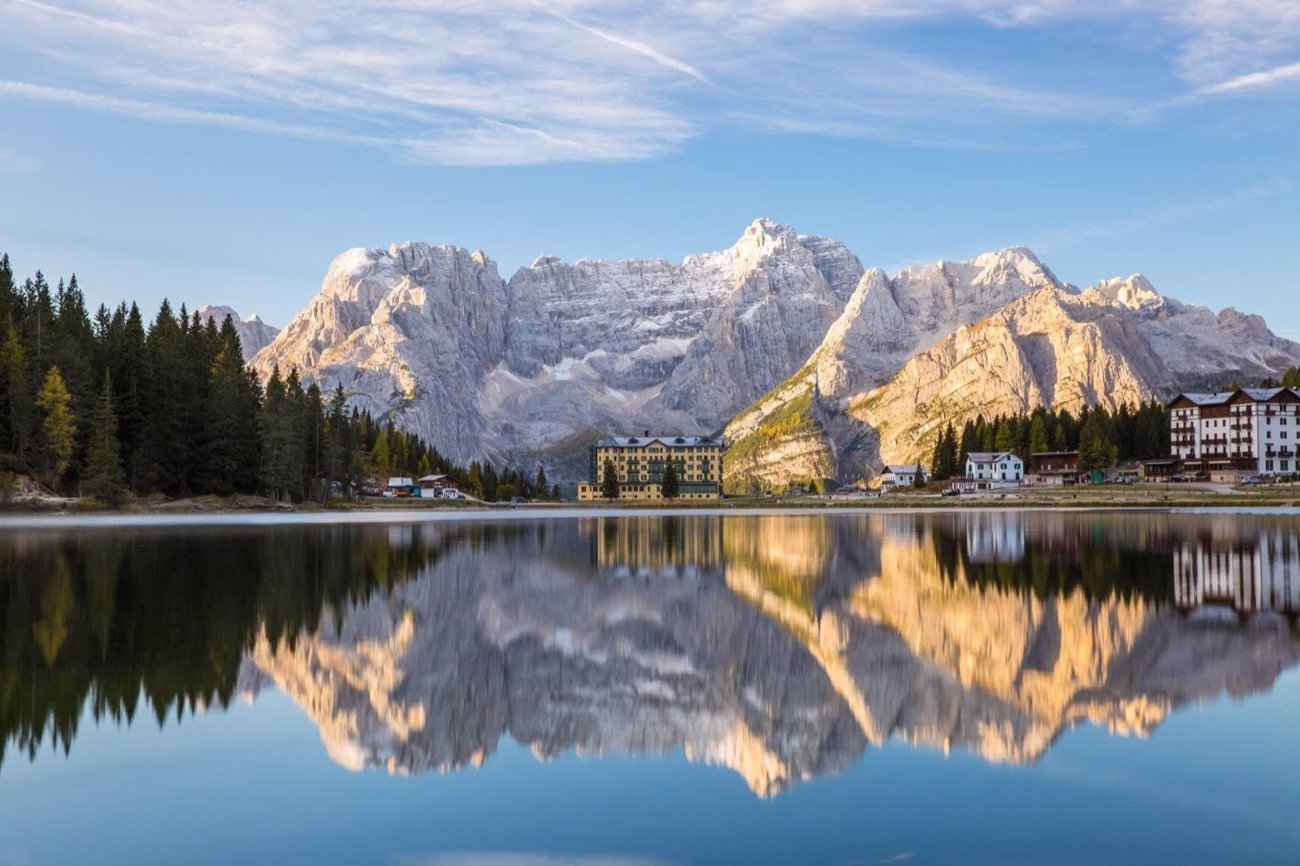 Lake Misurina mirroring the Dolomite peaks at dawn